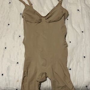 Skims mid thigh low back body shaping suit